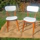 vintage wooden chairs with white faux leather