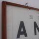 Old optical advertising poster, monoyer scale, framed