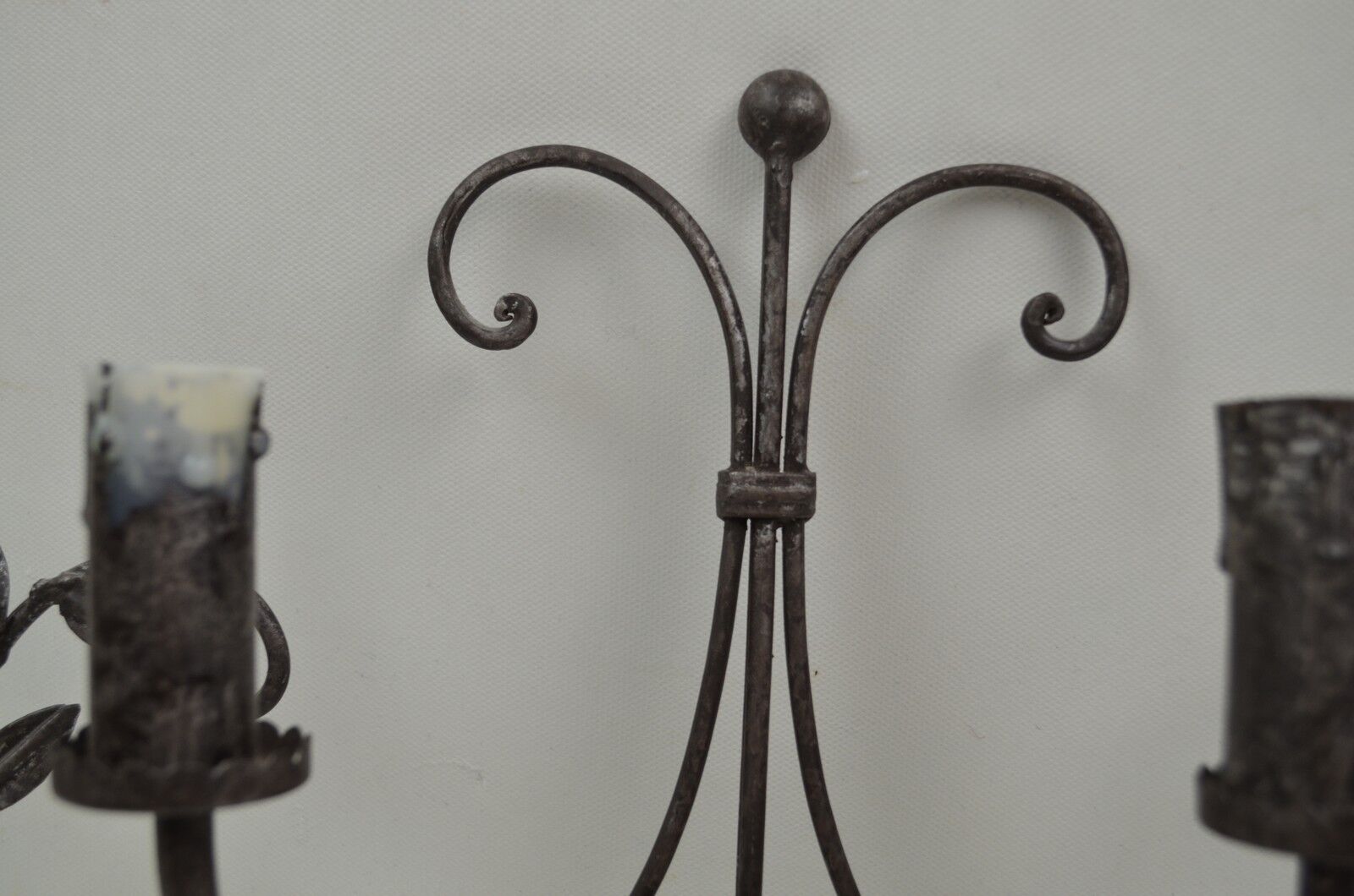 pair of grey patinated iron wall sconces