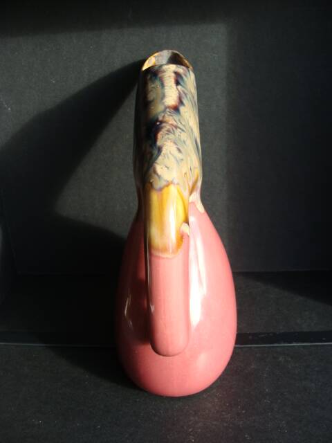 Vintage bird beak pitcher