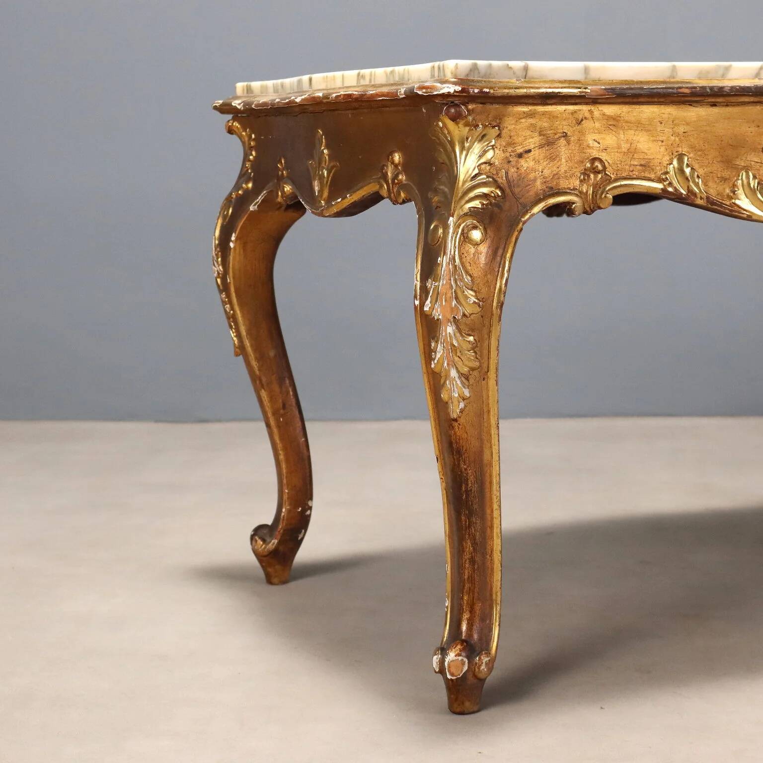 Small antique baroque-style table in carved fir and marble from the 19th century.