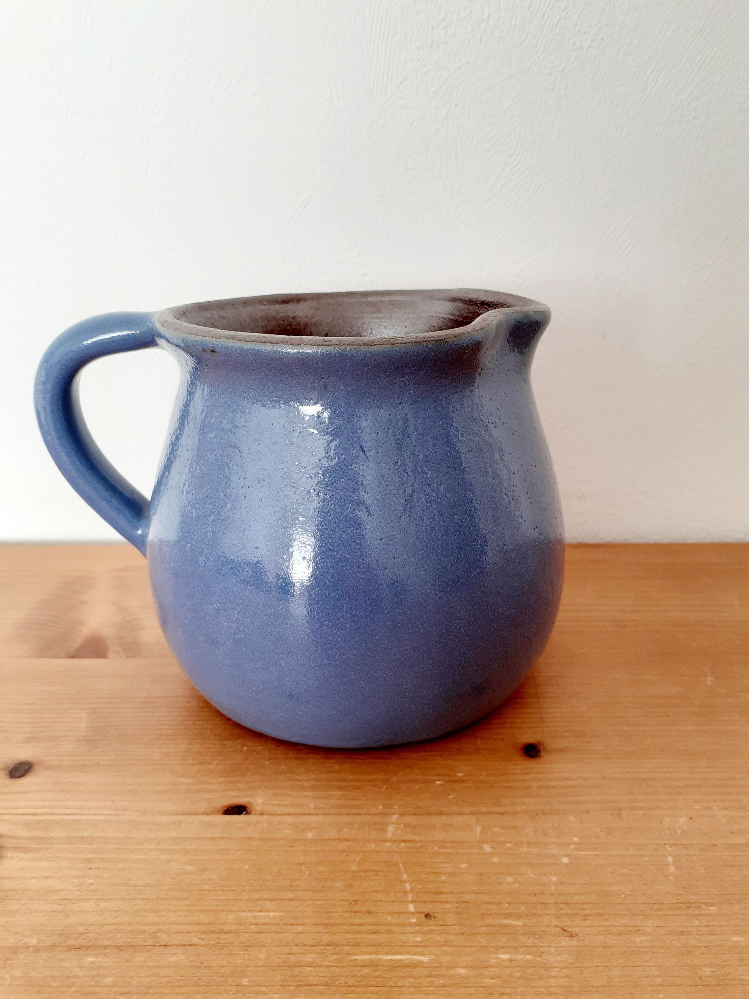 Old glazed blue sandstone pitcher
