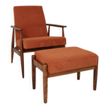 Vintage armchair and footrest in orange corduroy.
