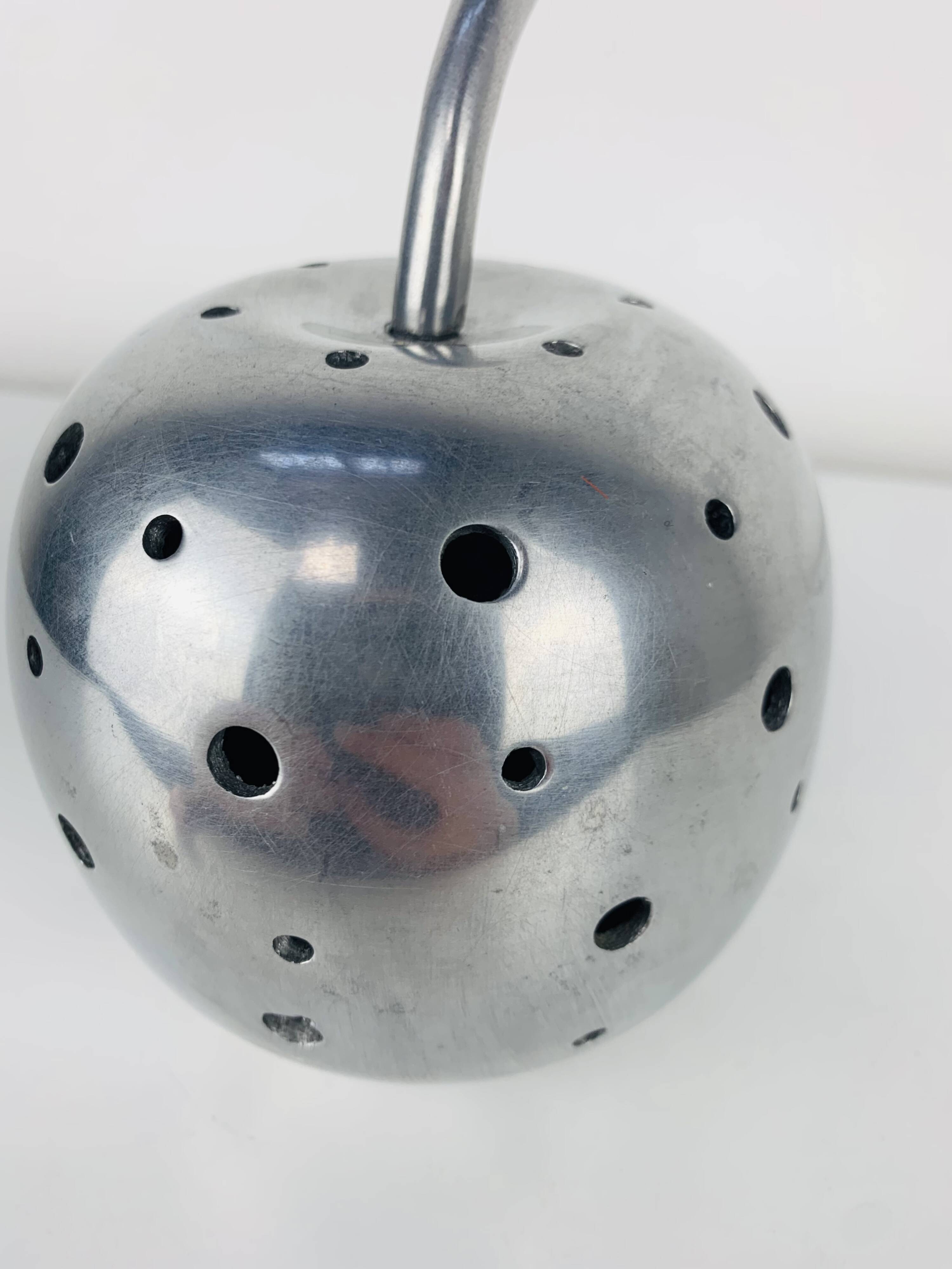 Aluminium apple sculpture, 1970s, candle holder