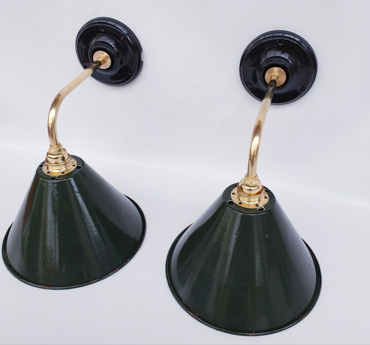 Pair of antique enamelled sheet metal wall lights