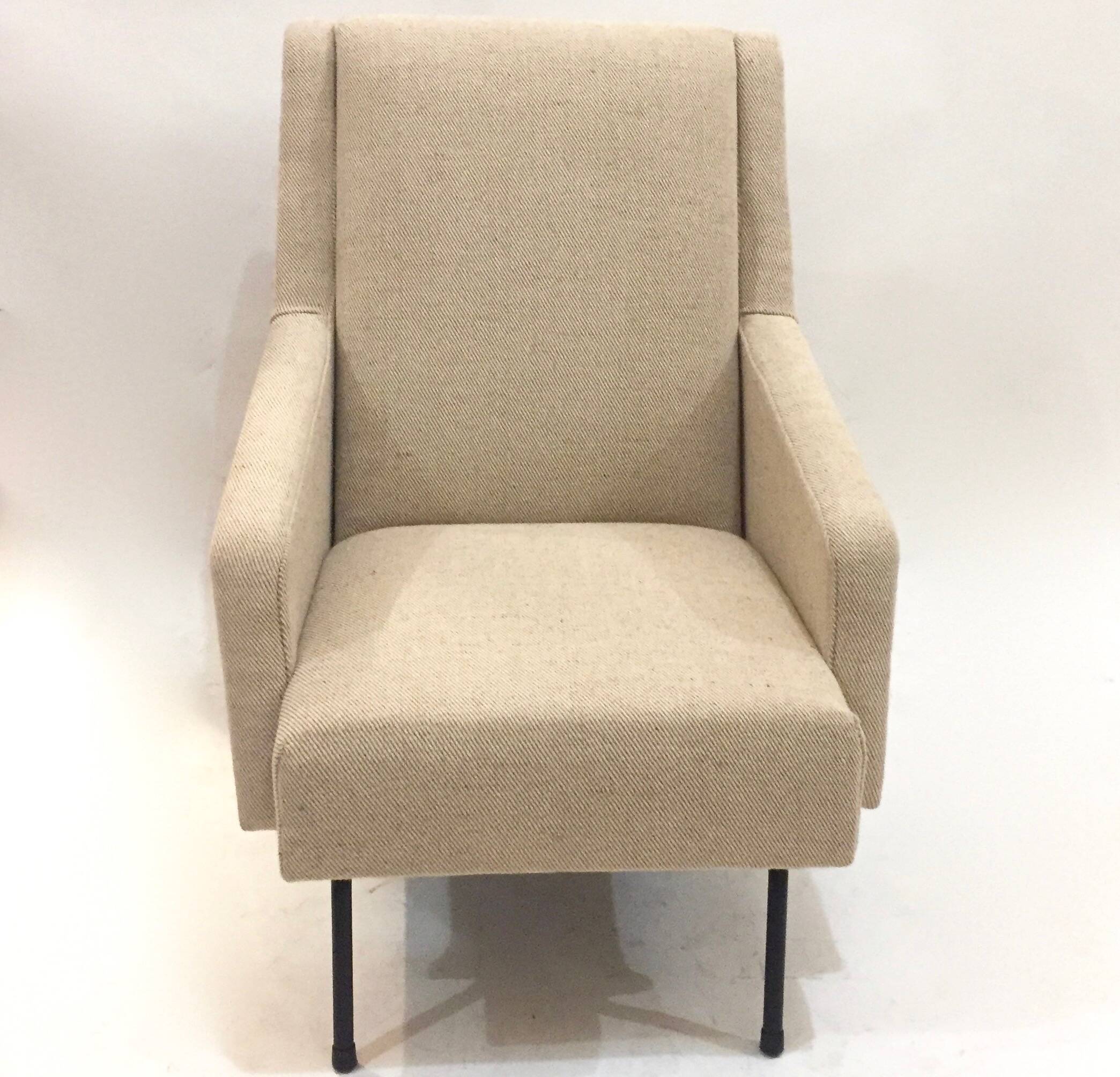 reupholstered modernist armchair