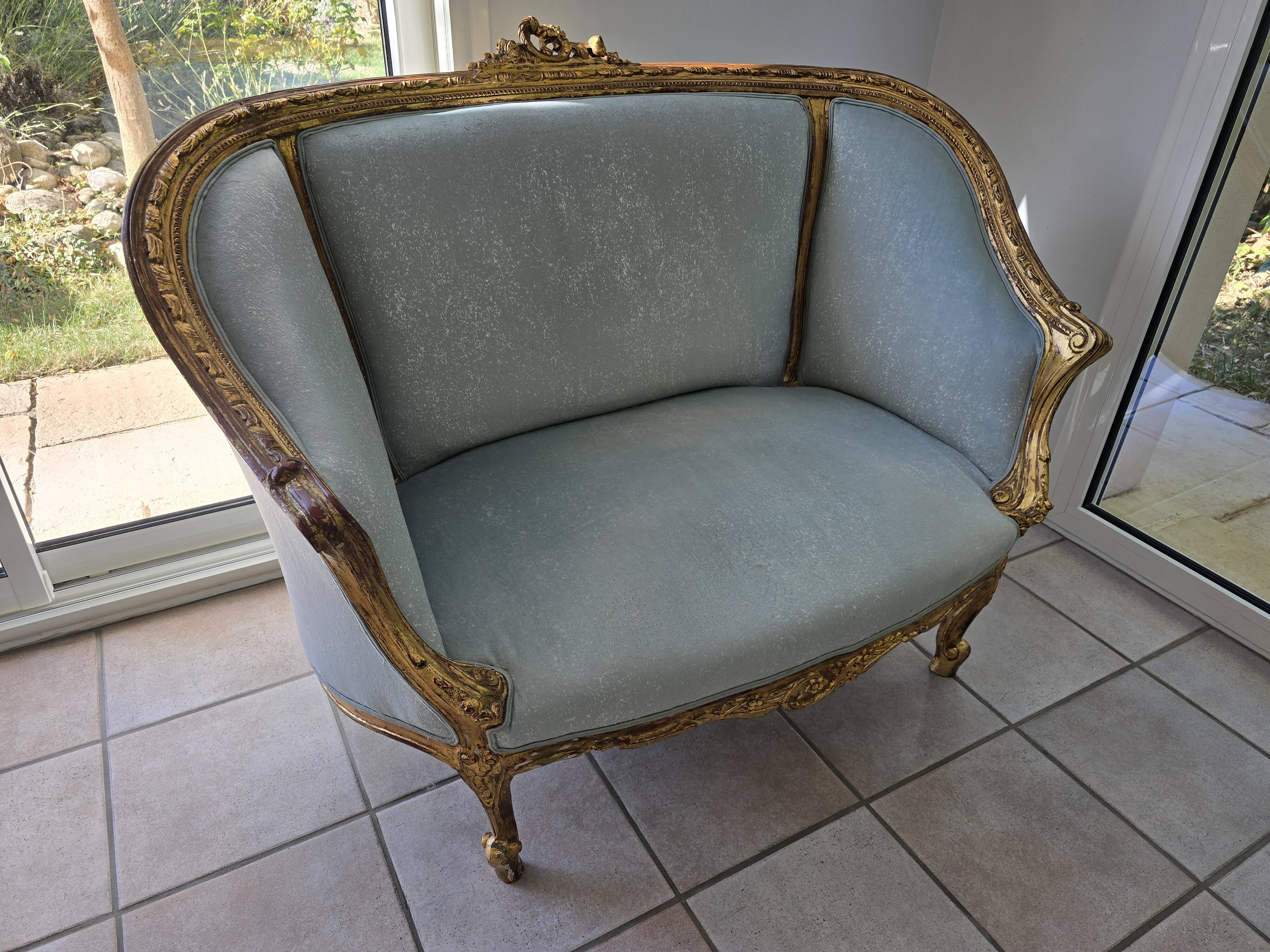 Louis XV gilt basket canapé with green velvet.