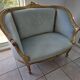 Louis XV gilt basket canapé with green velvet.