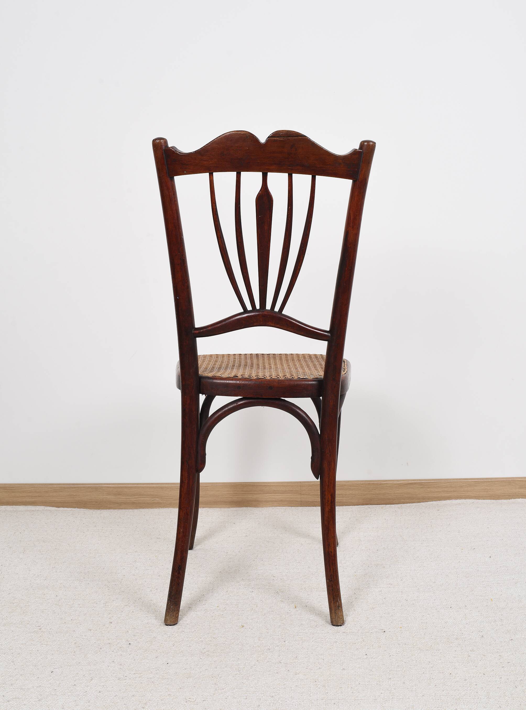 Old cane bistro chair, stamped fischel