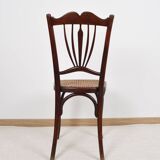 Ancienne chaise de bistrot en cannage, estampillée fischel