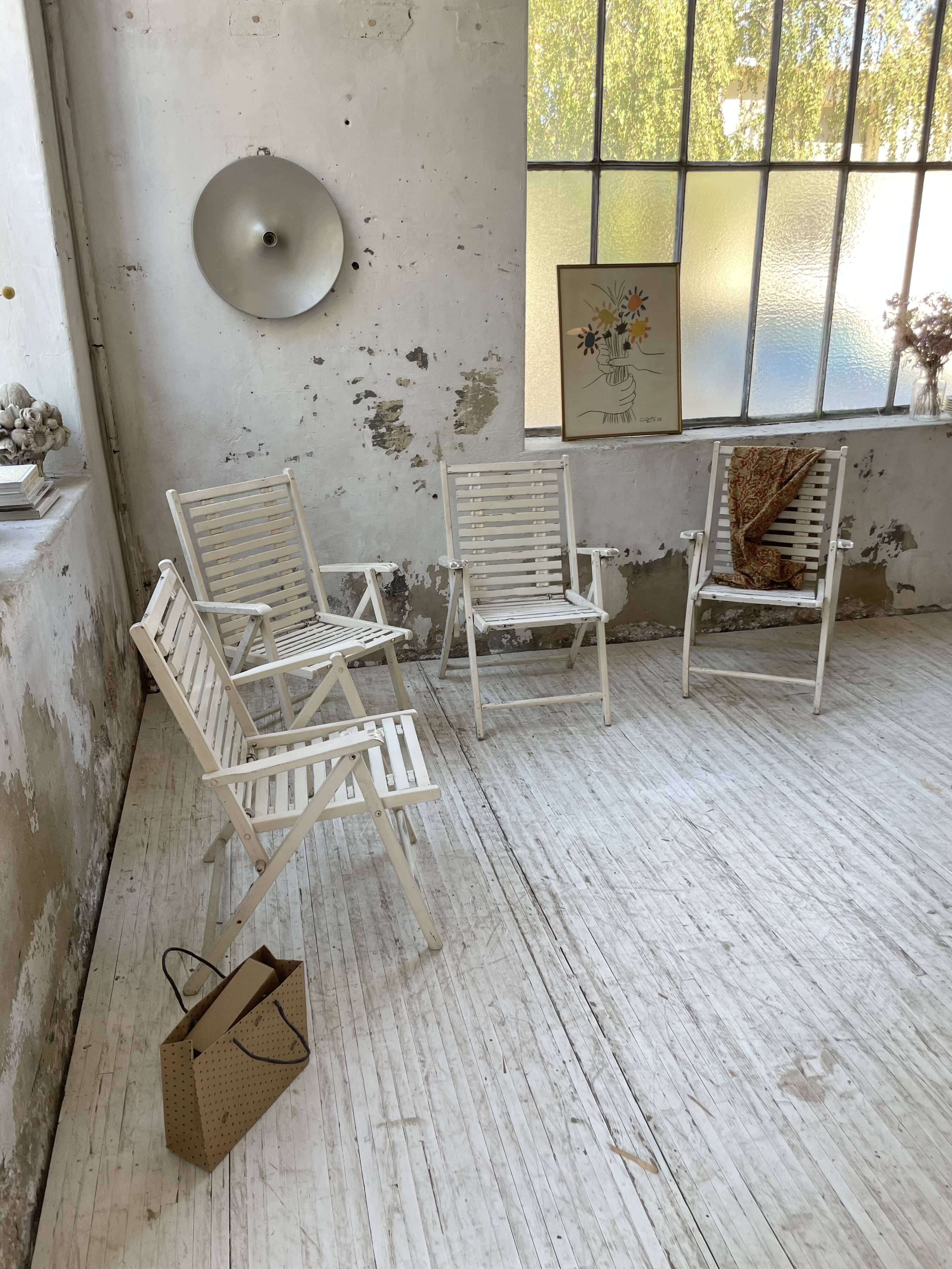 4 white wooden garden chairs