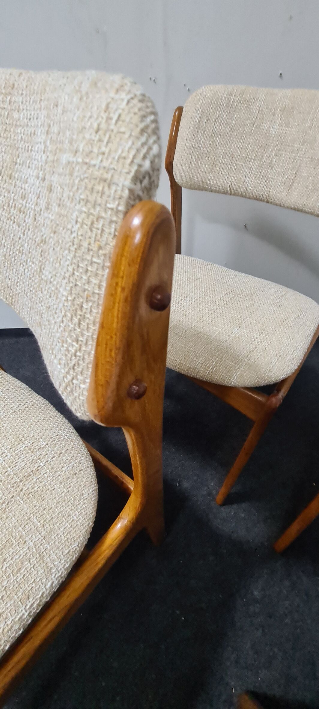 A set of four vintage teak dining chairs