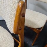 A set of four vintage teak dining chairs