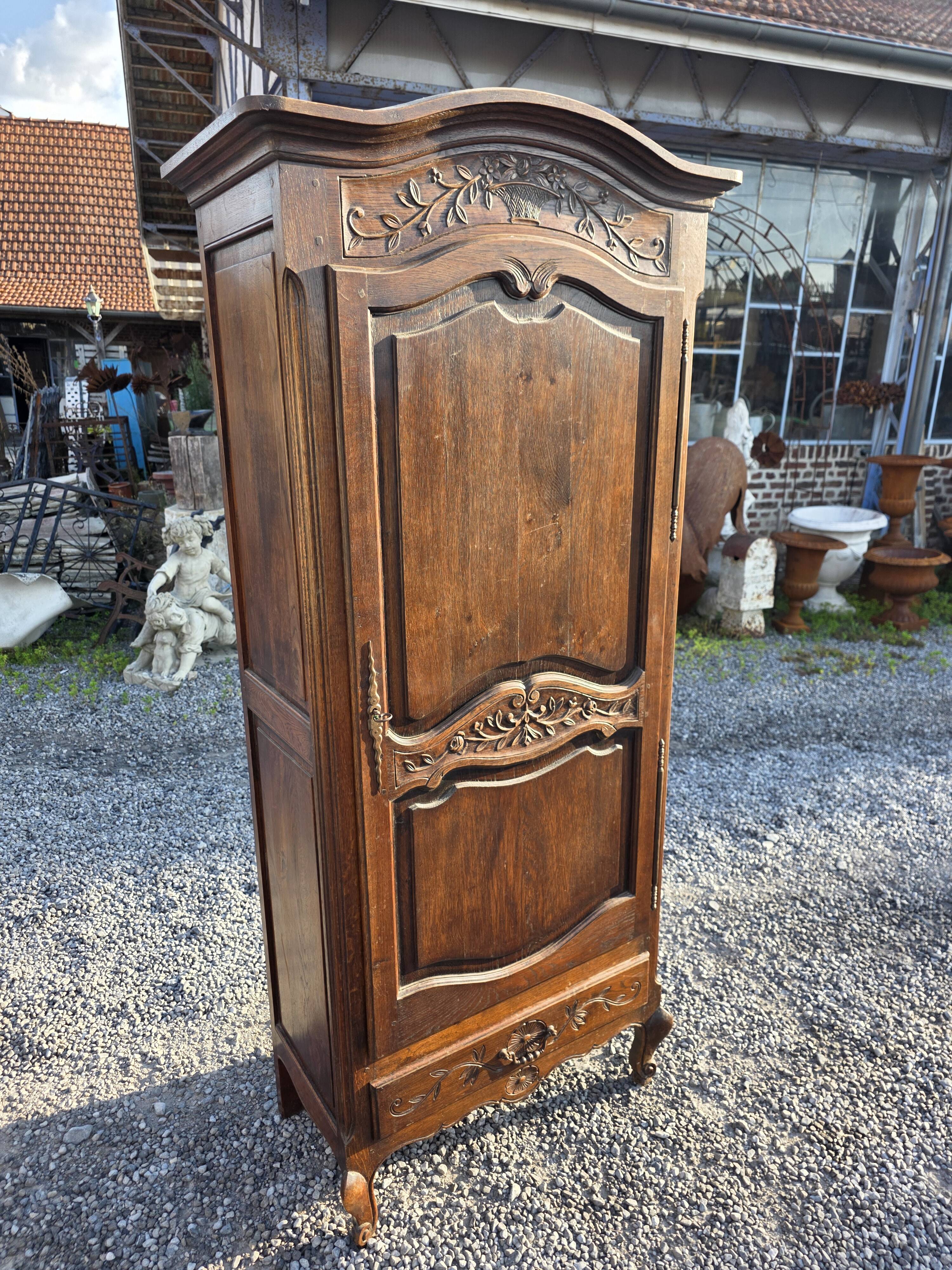 Louis XV style bonnetière in solid oak