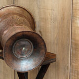 Copper vase hammered on pedestal