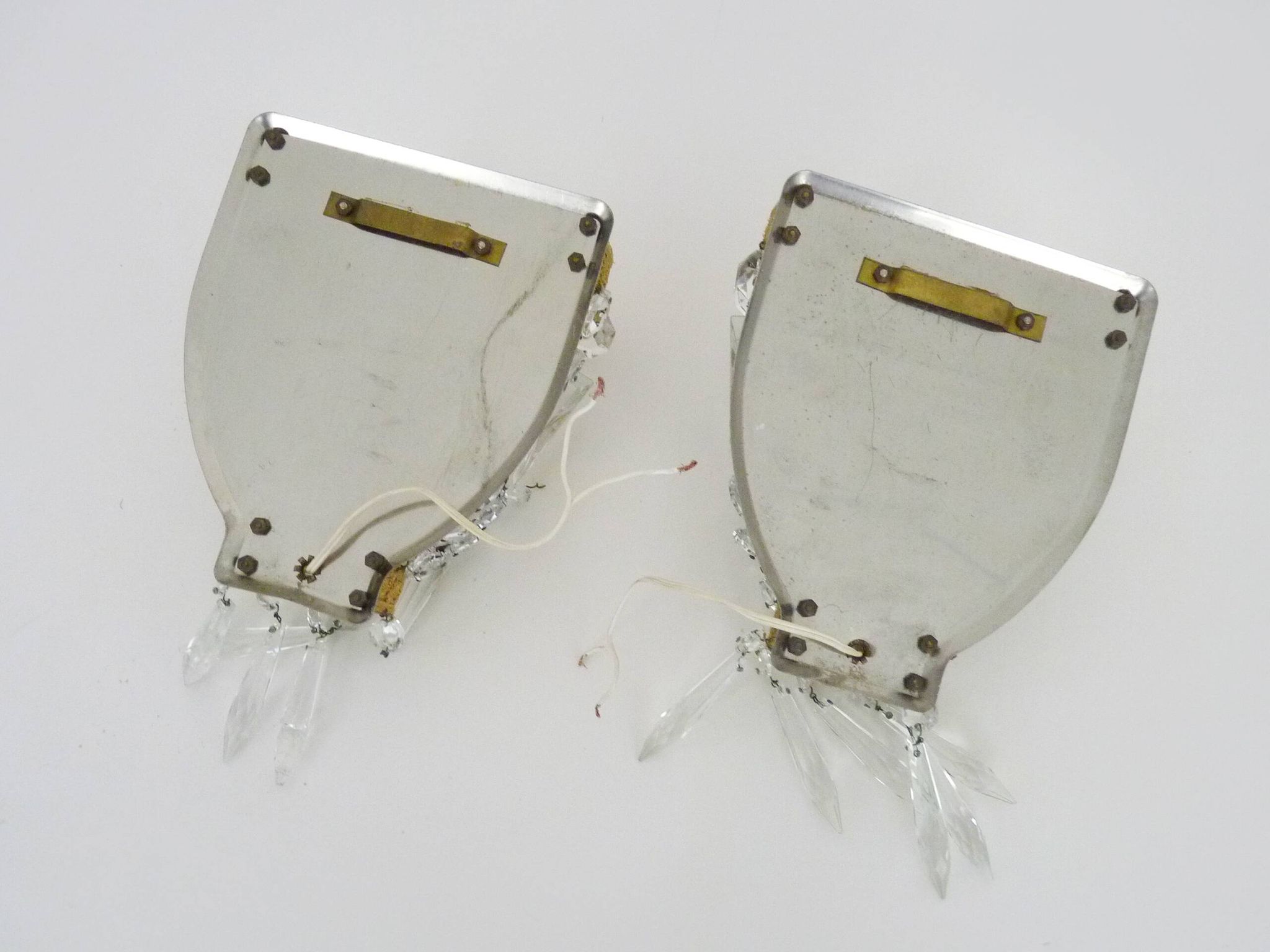 Pair of vintage bronze basket wall lights with glass pendants. The 50's