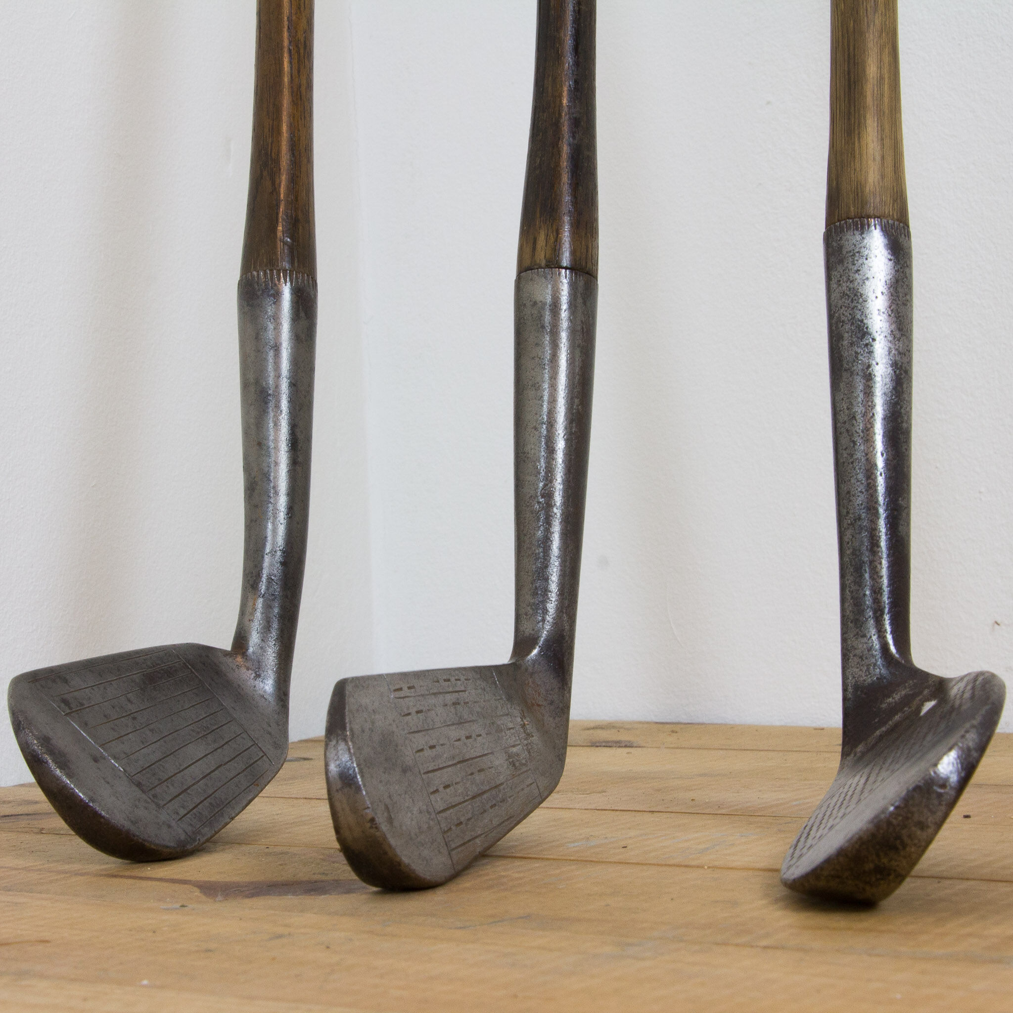 Set of 4 polished vintage golf clubs