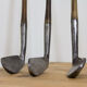 Set of 4 polished vintage golf clubs