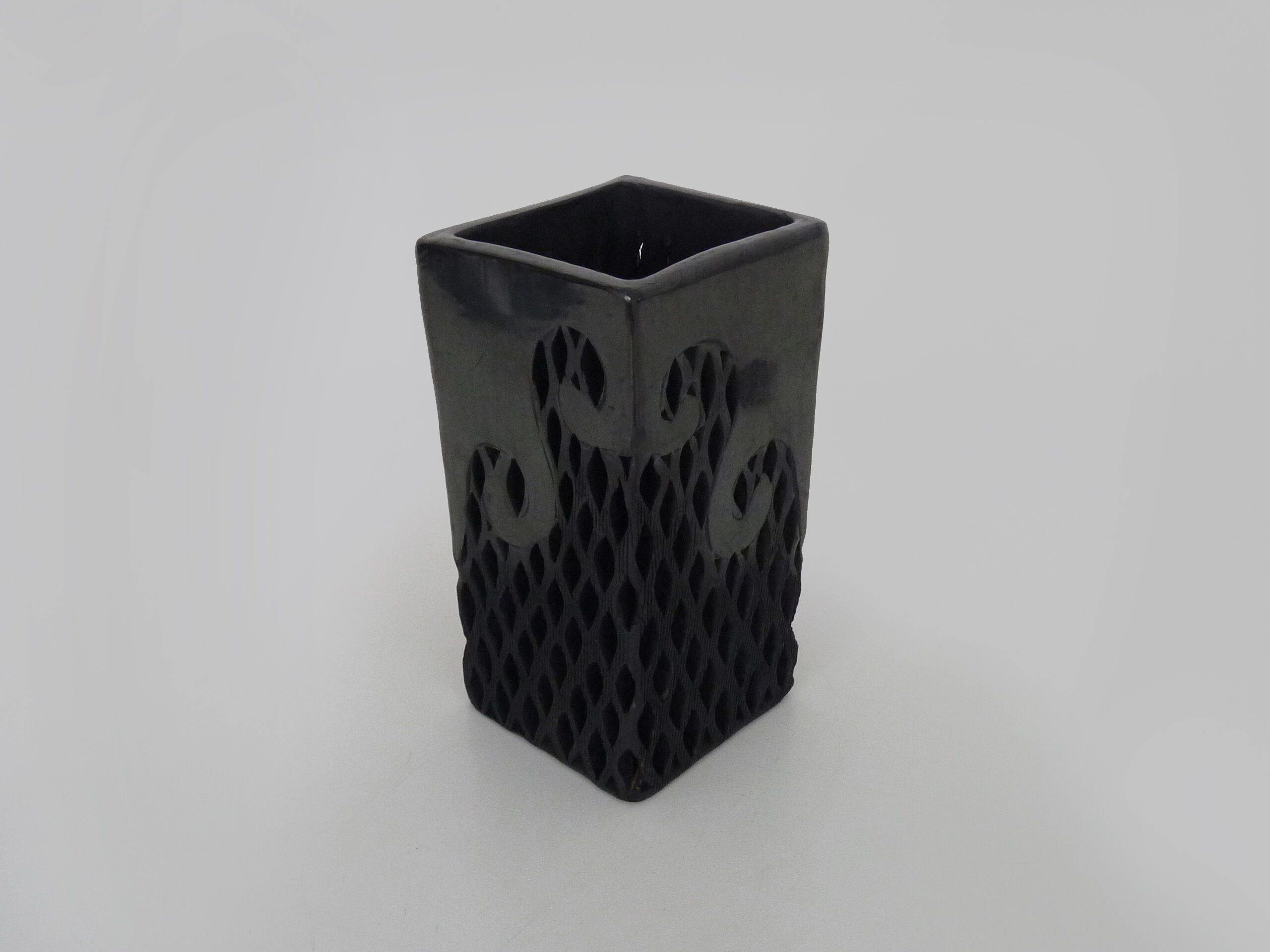 Vase Dona Rosa Oaxaca Mexico black openwork. Mexican folk art. Year 70