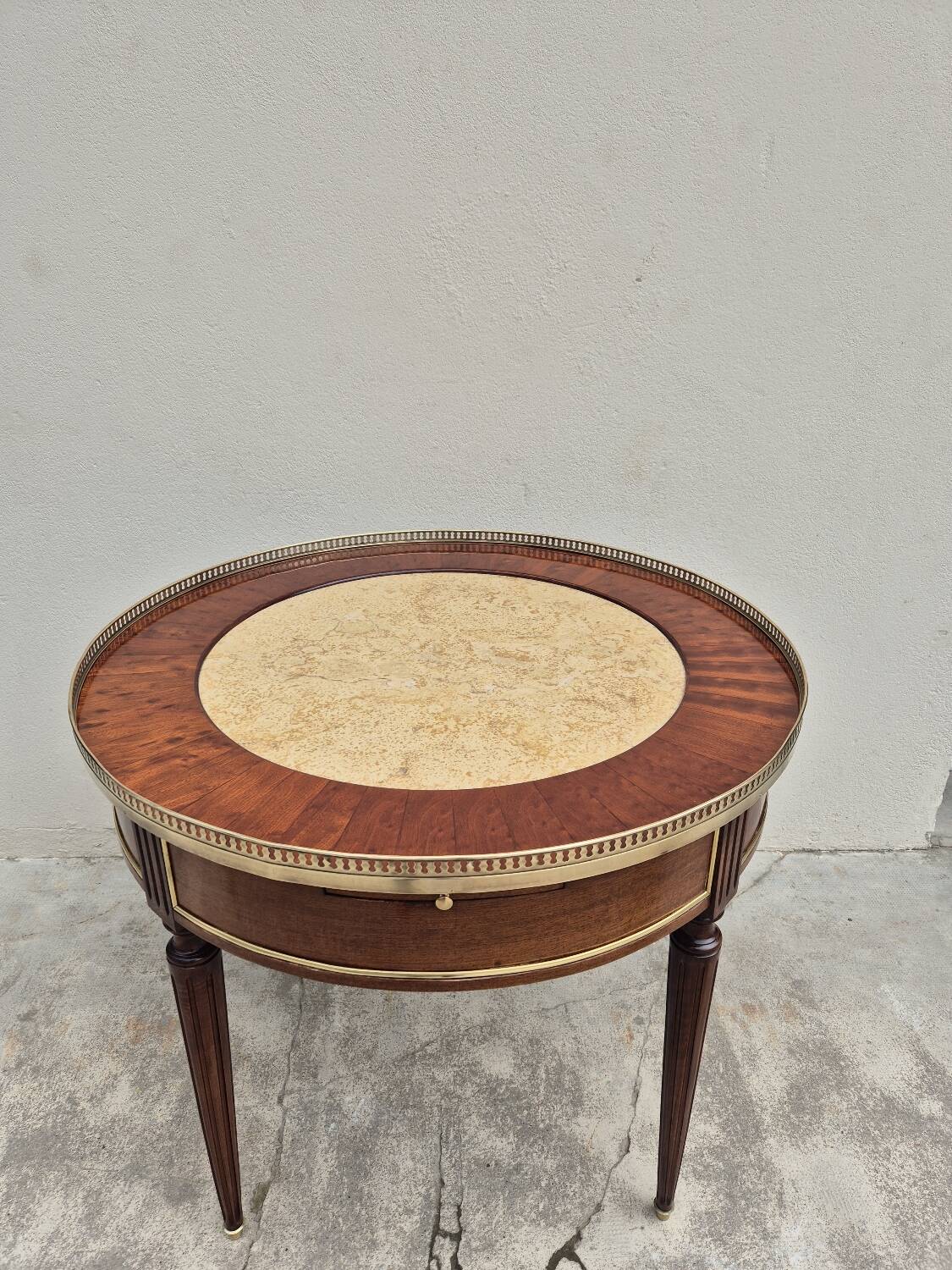 Louis XVI style mahogany bouillotte table in marquetry and bronze