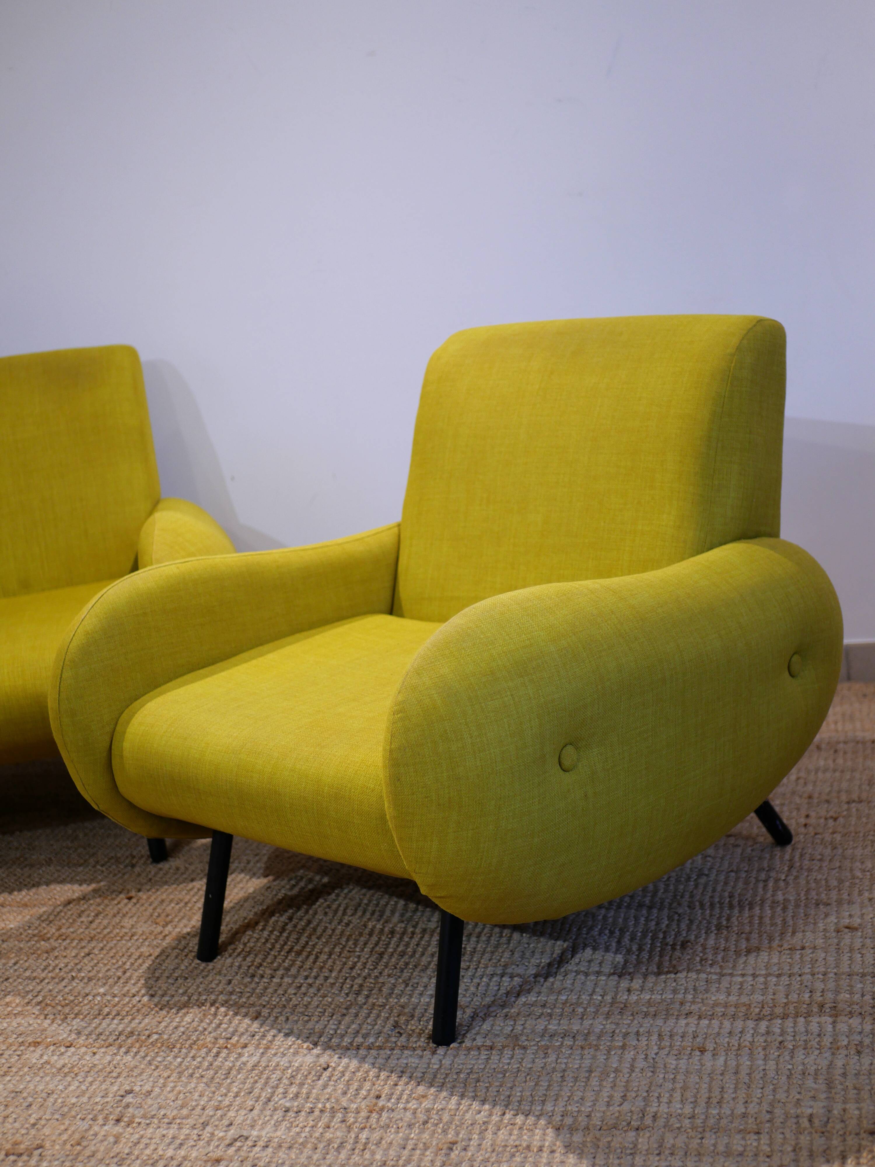 Pair of low armchairs in 60s–70s style
