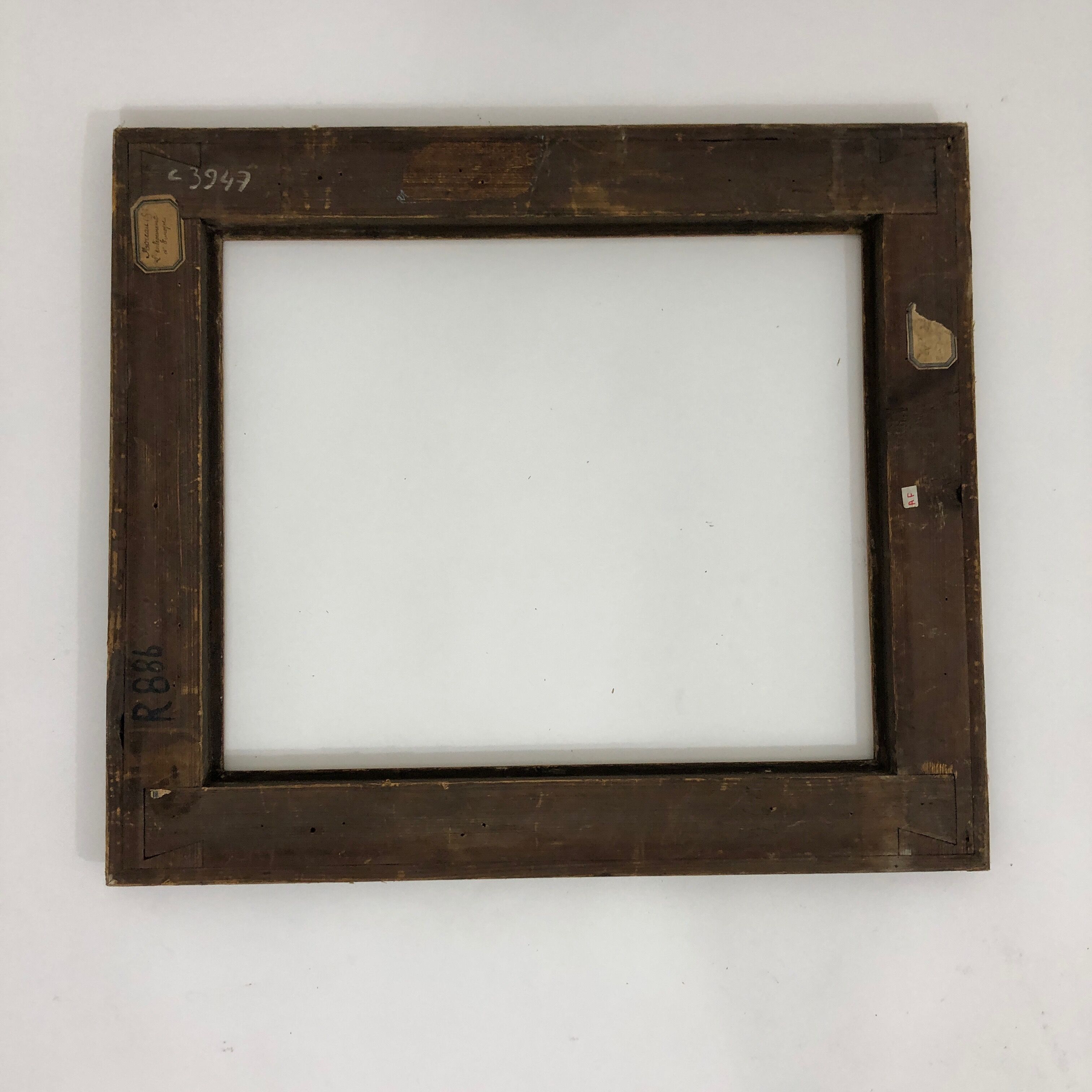 Vintage gilded frame decorated with stylized flowers