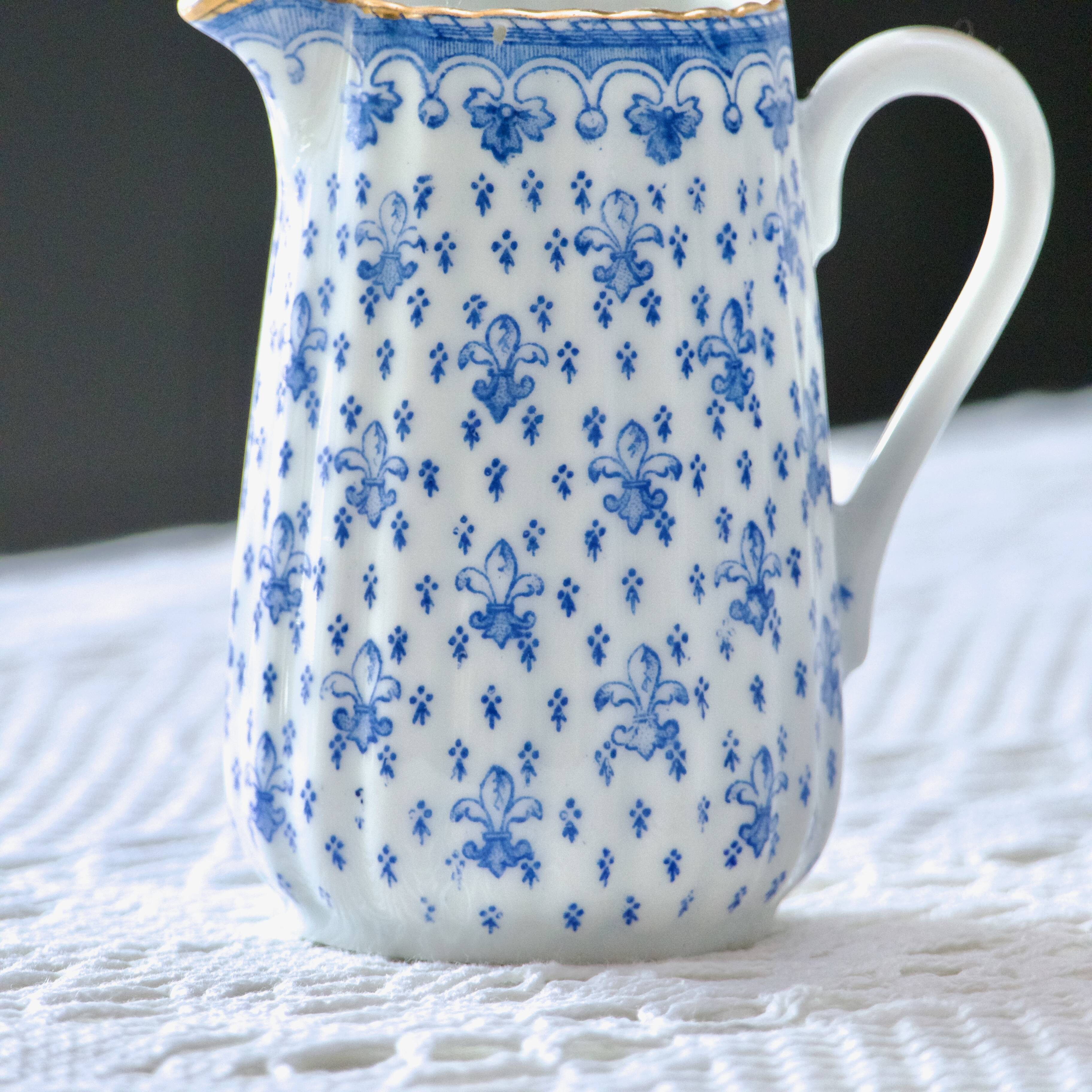 Oscar Shaller 1909 Fleur de Lys Porcelain Pitcher