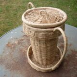 Basket shaped cup or vase with handles and wicker lid