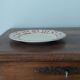 Earthenware serving plate with cherry decoration