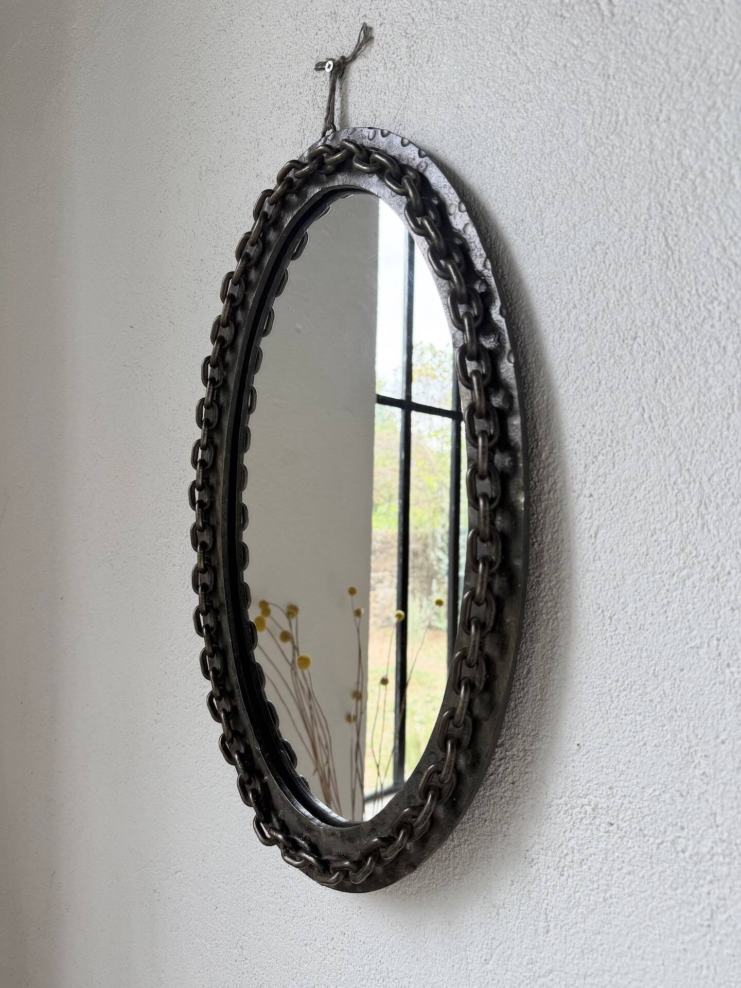 Miroir brutaliste ovale « chaine » 1950