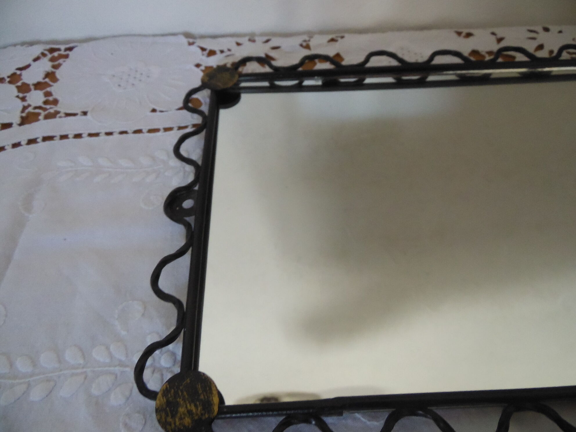 Wrought iron tower mirror