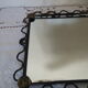Wrought iron tower mirror