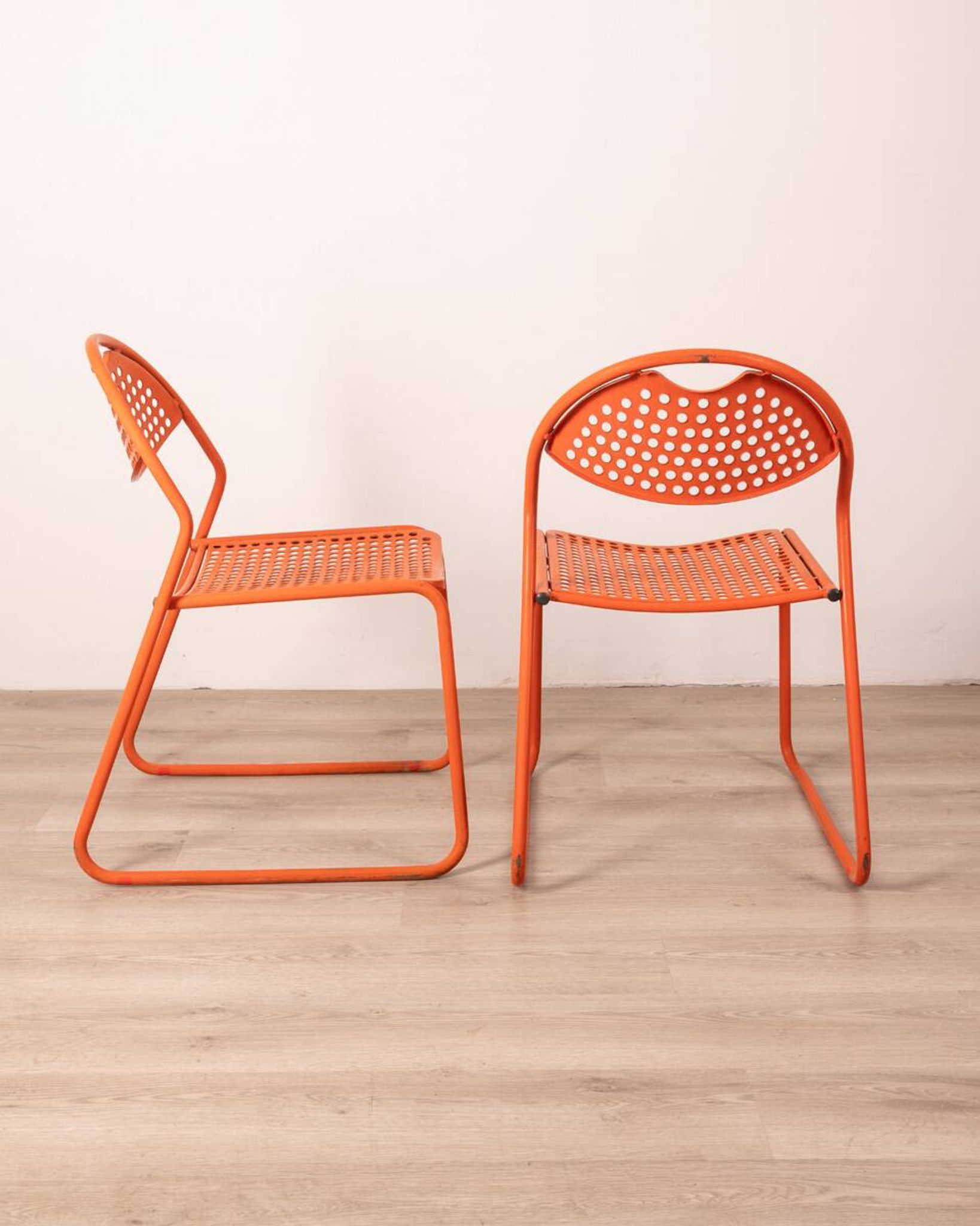 Pair of vintage red garden chairs from the 70s, italian design