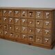 Antique German Pine Apothecary Cabinet with Enamel Shields, 1900s