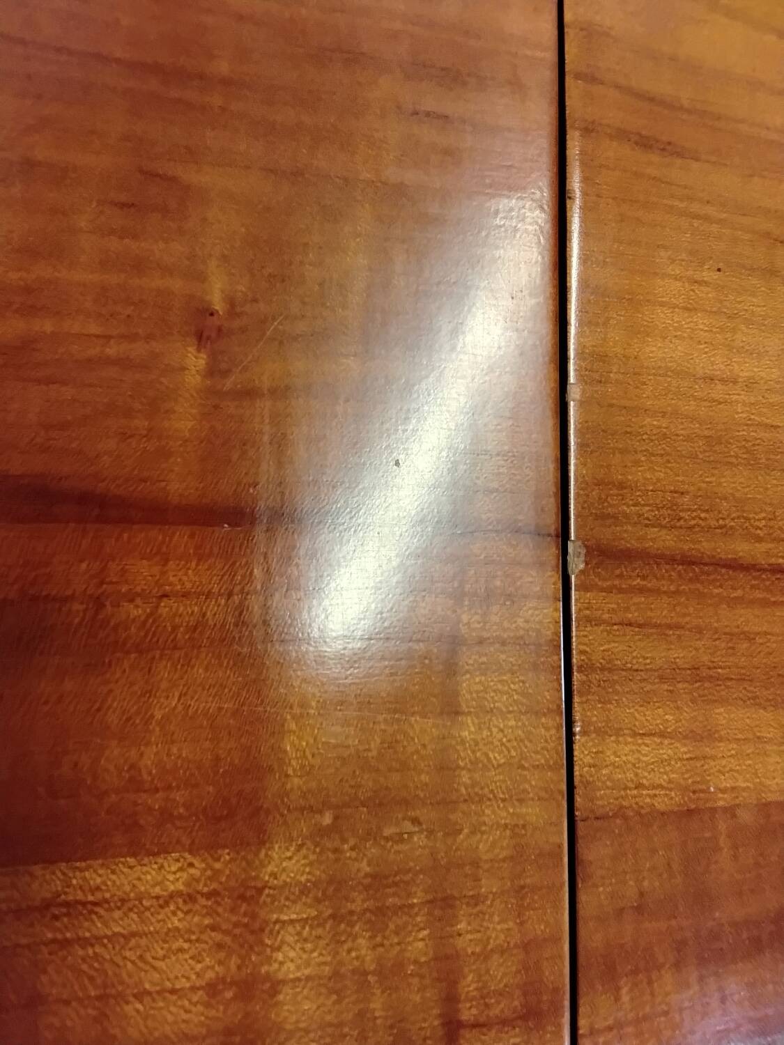 Small wooden drop-leaf table