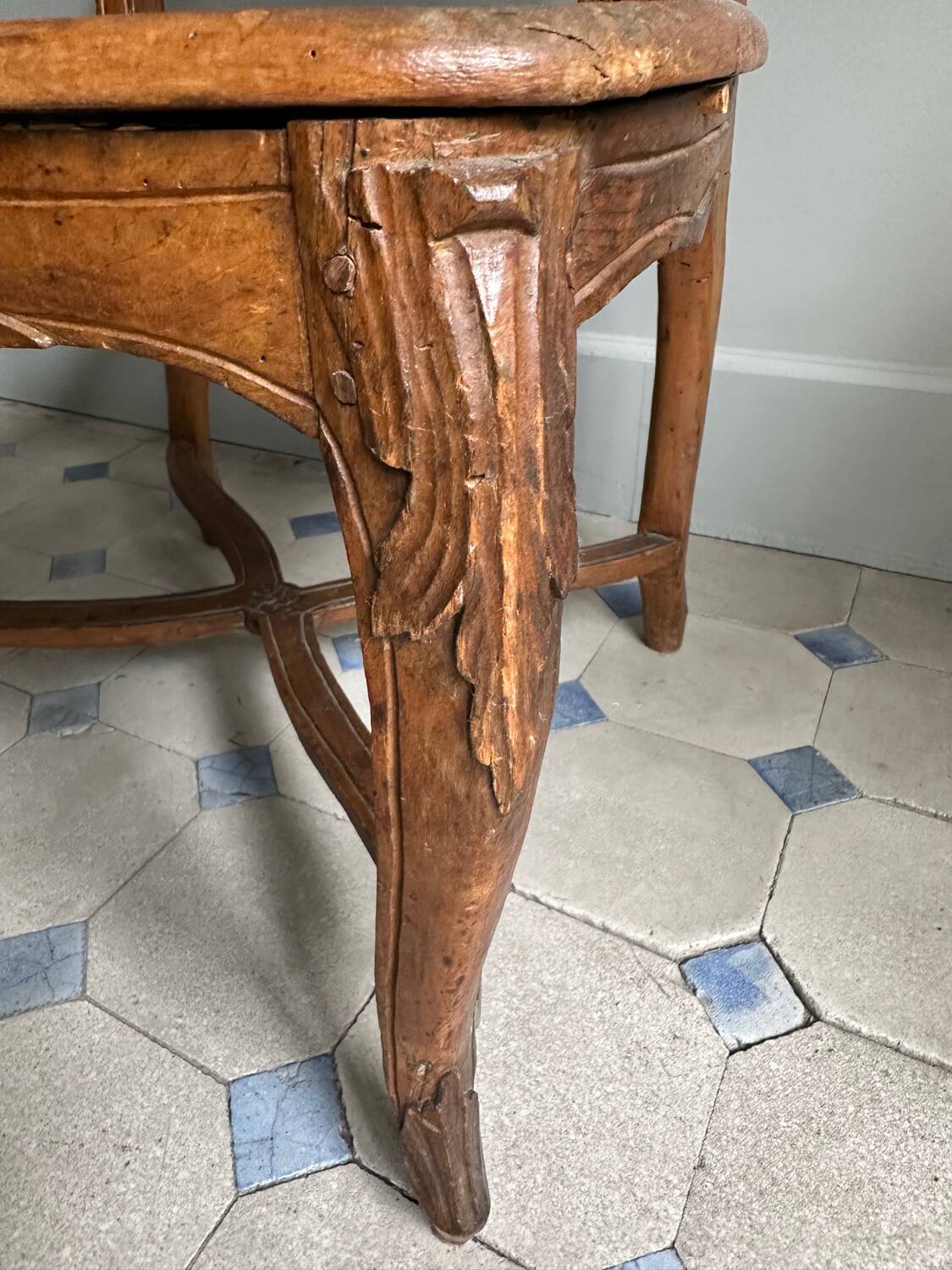 Regency armchair with stretcher