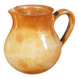 The stoneware pitcher