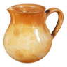 The stoneware pitcher