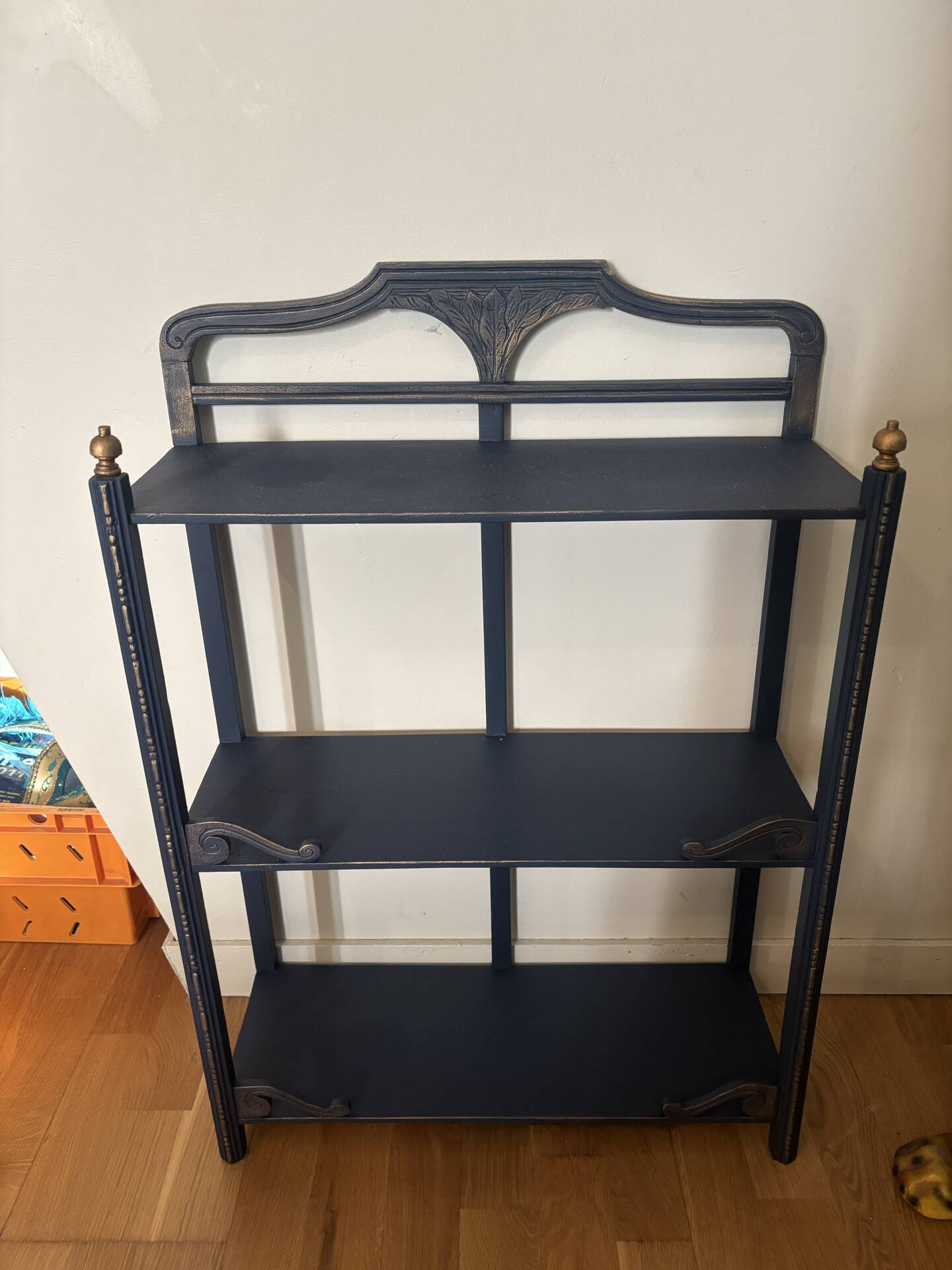 Small vintage shelf reimagined in midnight blue & gold, curiosity cabinet.