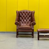 Brown leather chesterfield wing chair with Ottoman