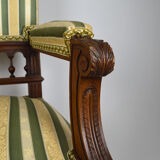 Neo-Renaissance walnut armchair with lion heads, circa 1880