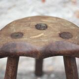 Vintage wooden tripod stool, mountain work, wabi-sabi, shepherd.