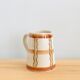 Vintage graphic pitcher in hand-painted ceramic