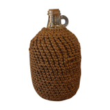 Cylinder glass surrounded by rope