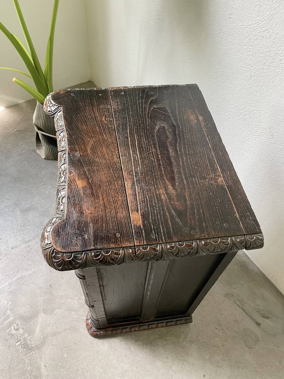 19th century chest of drawers in carved blackened pine
