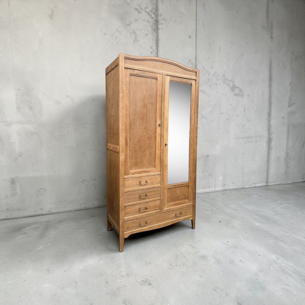 Parisian hotel wardrobe with bevelled mirror, solid raw oak, 1920.