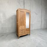 Parisian hotel wardrobe with bevelled mirror, solid raw oak, 1920.