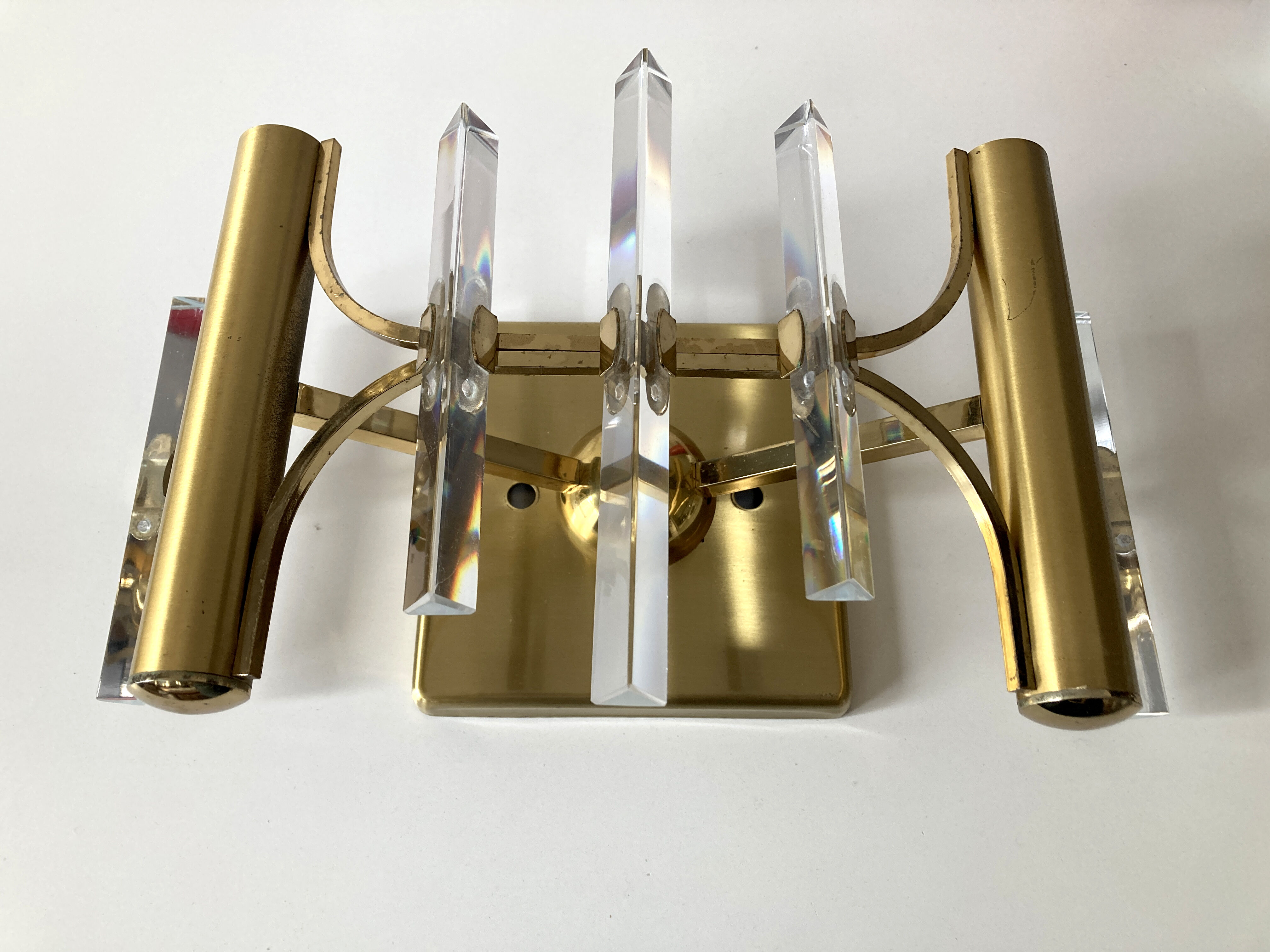 Golden wall lamp and glass crystals. 1970