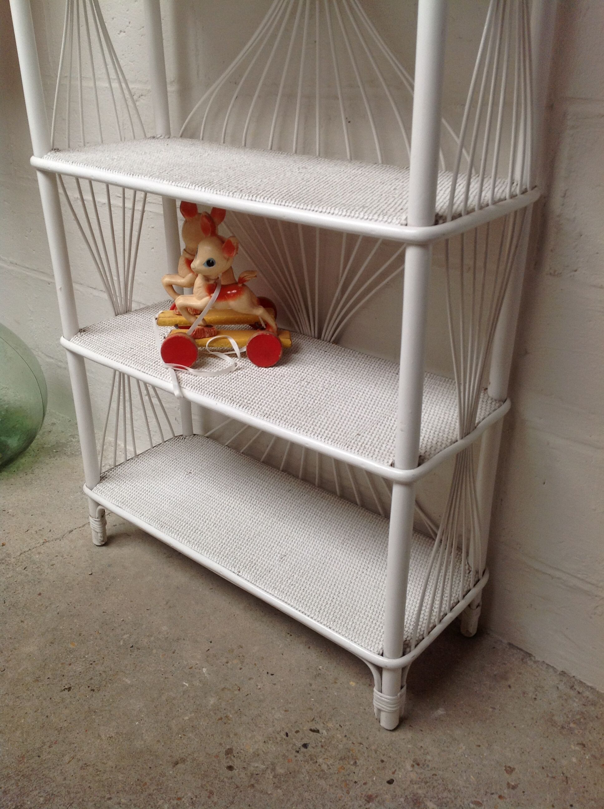 White lacquered rattan bookcase