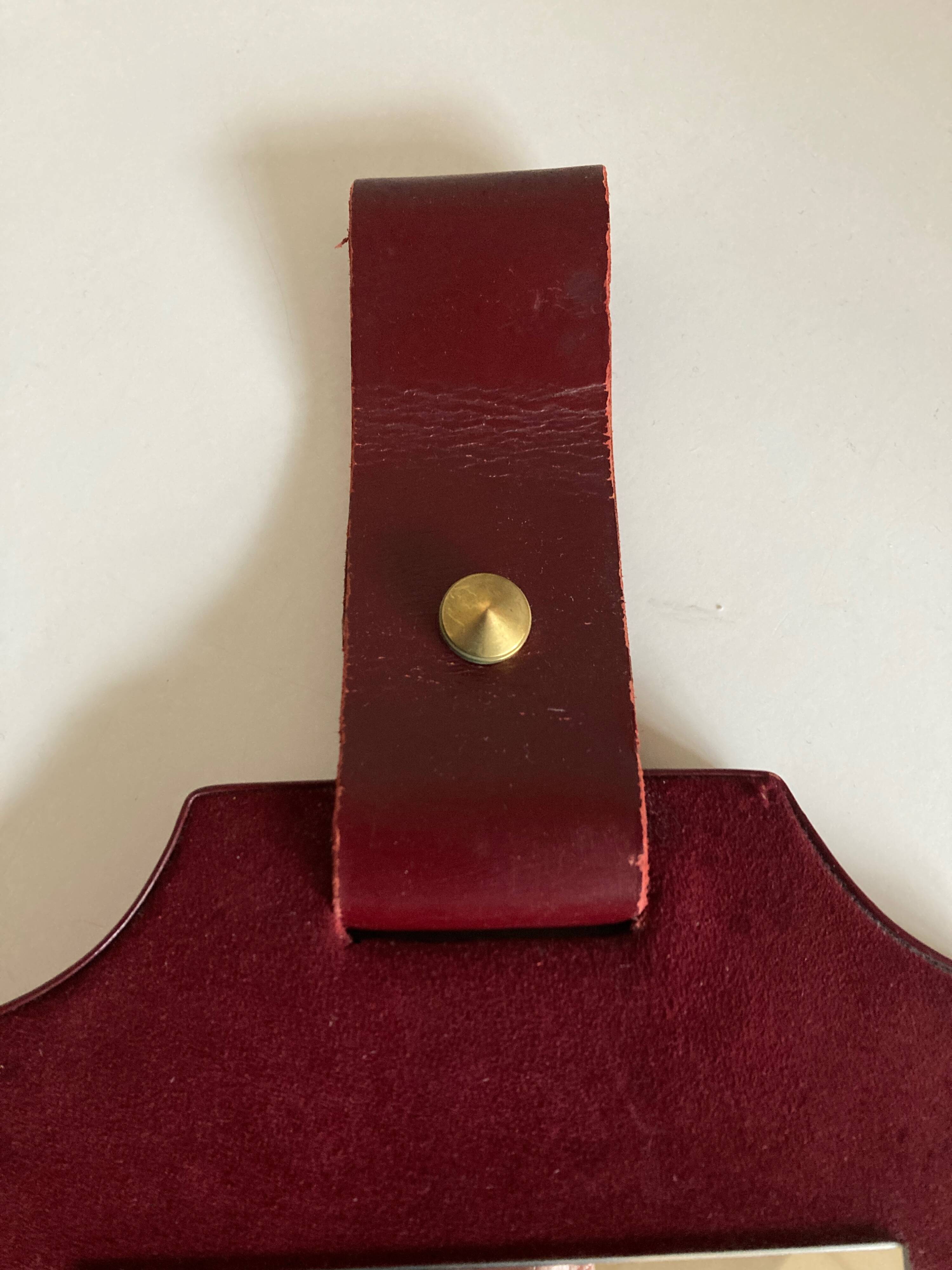 1960 cloakroom mirror with leather and brass shelf